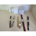 An assortment of eight watches to include a manual wind Rotary Incabloc with date - running, and a
