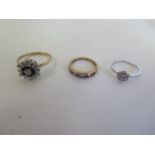 A 9ct white gold diamond cluster ring and two 9ct dress rings, approx 6.1 grams