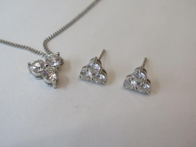 An 18ct white gold three stone diamond pendant on chain, total diamonds approx 1ct with matching - Image 3 of 3