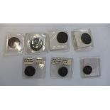 A collection of seven ancient coins