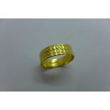 A 22ct yellow gold band ring, size S/T, approx 4 grams