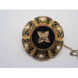 A Victorian gold diamond and pearl brooch set with black enamel, gold tested as 9ct, brooch diameter