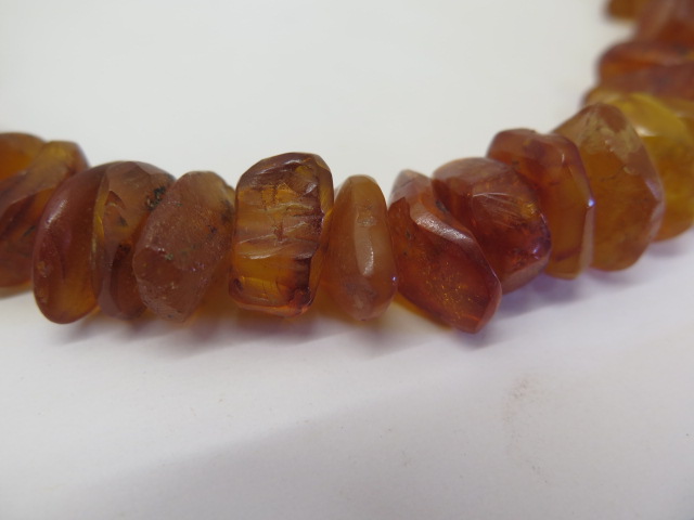 Two strings of deep honey colour un-cut polished amber beads, total weight approx 168 grams, lengths - Image 3 of 4