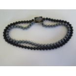 A hematite and jet set necklace with 9ct clasp