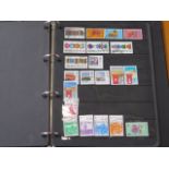 A collections of Commonwealth stamps in a stock-book, including number of better sets and part