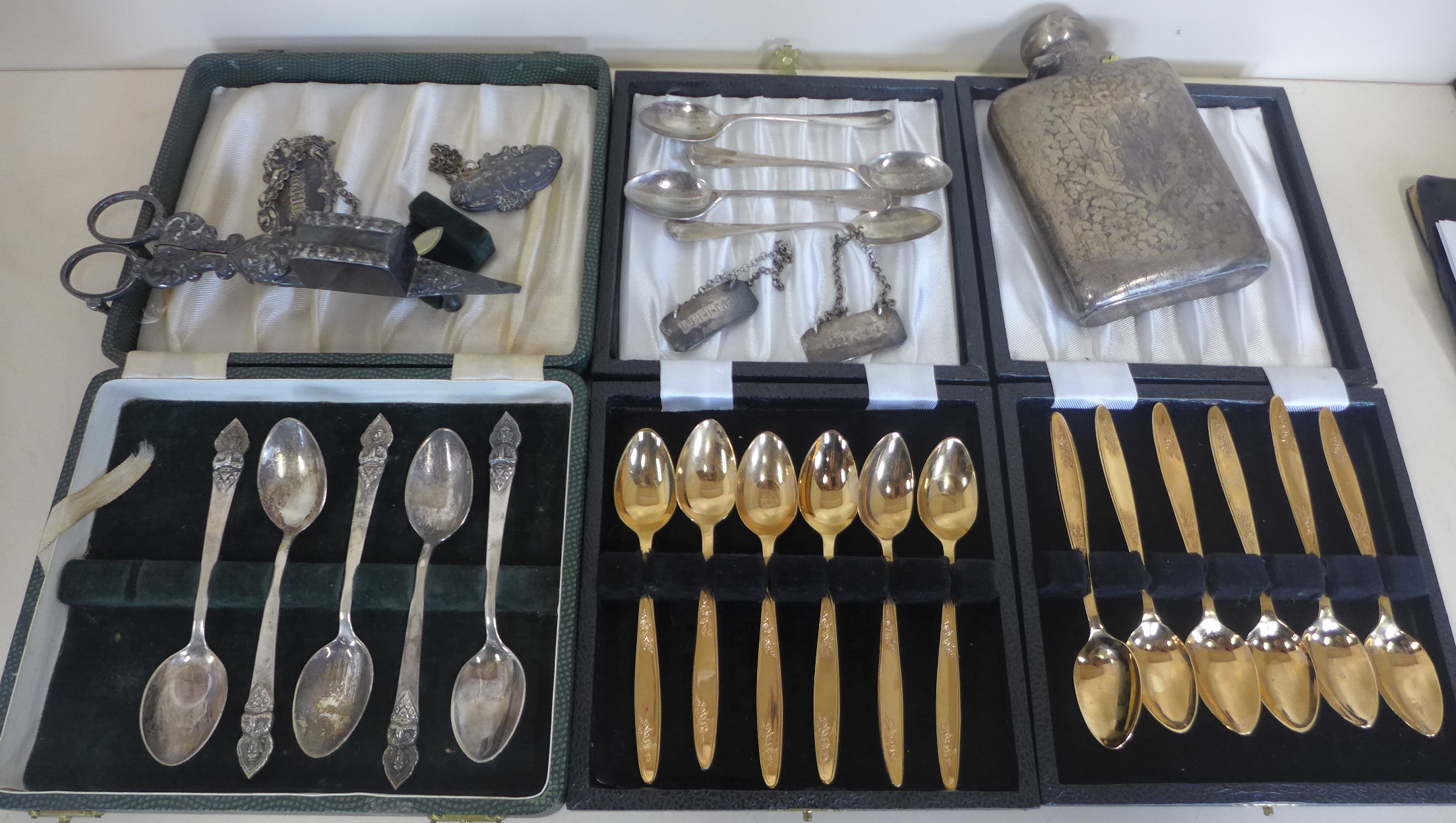 A small collection of silver and plate to include silver spoons, silver hip flask - split, gold