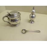 An English silver mustard, missing its liner and a pepperette, some surface marks and minor dents,