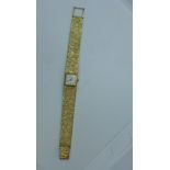 A ladies 9ct gold Omega wristwatch and strap, manual movement type 484 Serial no 25419995, 17