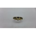 A hallmarked 9ct yellow gold sapphire and diamond ring size L - approx weight 2.9 grams - some usage