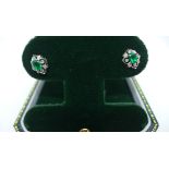 A pair of 18ct white gold good quality emerald and diamond earrings hallmarked - approx 10mm x 8mm -