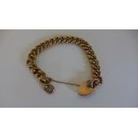 A 9ct yellow gold hollow link bracelet. The lock is hallmarked, chain link marked 9c, approx 18.9gs.