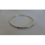 Silver Tiffany & Co bangle. 6.5cm external diameter. Some marks consistent with use otherwise good