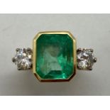 An impressive 18ct yellow gold Emerald and Diamond ring - The natural untreated Columbian Emerald is