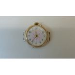 A 9ct yellow gold trench type wristwatch with a decorative enamel dial. Case 3cm wide, total