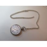 A silver top wind pocket watch 5cm wide, on a 46cm silver chain, running, generally good condition.