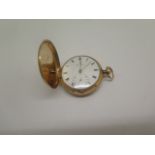 An 18ct gold full Hunter pocket watch by Barrands Cornhill London no 7613 with white enamel dial