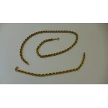 A hallmarked 9ct yellow gold ropetwist bracelet and necklace 21cm long and 47cm long - total