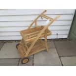 A new boxed teak drinks trolley