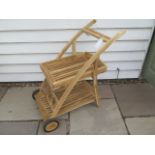 A new boxed teak drinks trolley