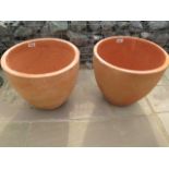 A pair of terracotta plant pots 43cm high - retail at £39.95 each