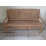 A good quality teak bench 150cm wide - boxed