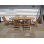 A new boxed teak garden table & 6 folding chairs. Table size extends from 180cm to 240cm with a 90cm