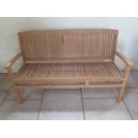 A good quality teak bench boxed 150cm wide