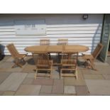 A new boxed teak garden table & 6 folding chairs. Table size extends from 180cm to 240cm with a 90cm