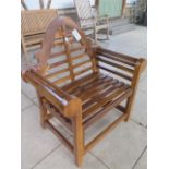 A pair of hardwood garden chairs - boxed