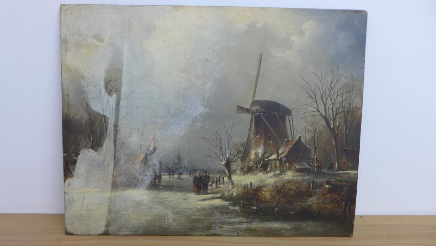 A Dutch school oil on board frozen river scene, initialled WMN 36 x 47cm with staining to left side,