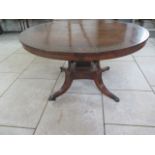 A Regency brass inlaid tilt top breakfast table. 71 cm tall x 126 cm diameter on a quatrefoil