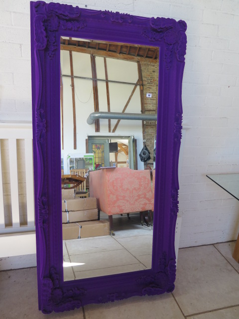 An ornate purple fabric effect mirror, 176 cm x 90 cm