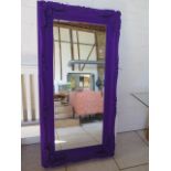 An ornate purple fabric effect mirror, 176 cm x 90 cm