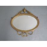 An ornate gilt 19th century wall mirror 56 x 54cm in original condition