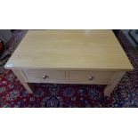 A modern oak coffee table with a single double sided drawer - Height 45cm x 90cm x 55cm - in clean