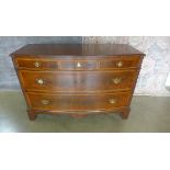A 20th century inlaid mahogany bow front chest of 3 over 2 draws. In polished condition 87 cm