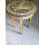 An unusual painted side table, 77cm tall, 61cm diameter