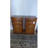 A pair of walnut 4-drawer chests made by a local craftsman incorporating older timbers. 86cm tall,