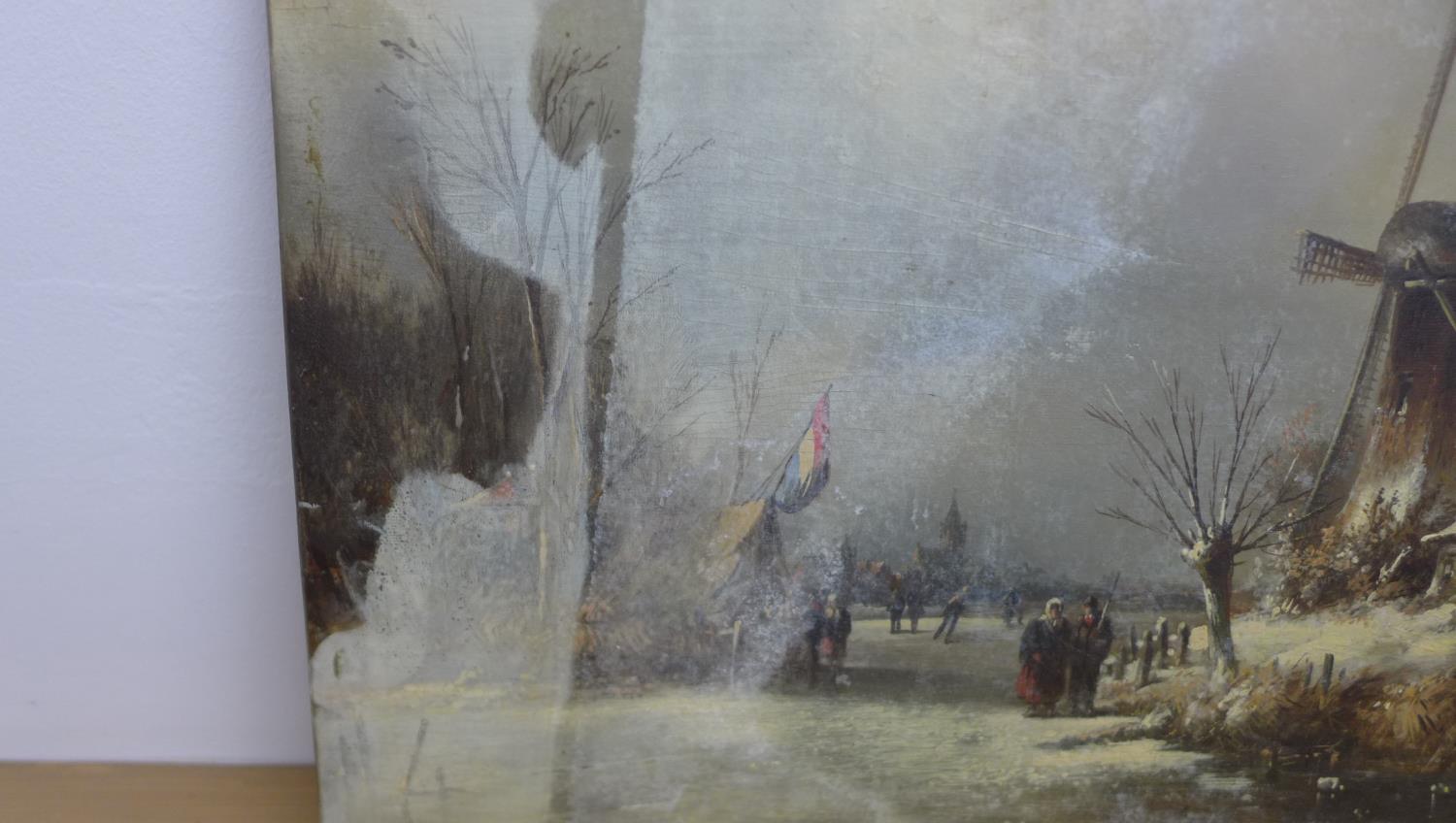 A Dutch school oil on board frozen river scene, initialled WMN 36 x 47cm with staining to left side, - Image 4 of 7