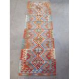 A hand knotted woollen- Choli Kilim runner. 194 x 63 cm