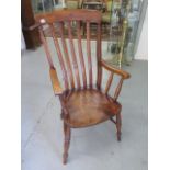 A Victorian elm seated grandfather chair. 107cm tall x 56cm wide with good colour and patina