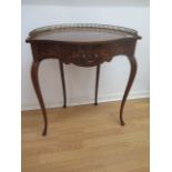 A pretty inlaid mahogany Edwardian demi lune side table with a drawer on shaped legs with a brass