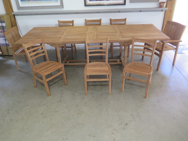 New boxed teak. Extending dining table with 2 fold out leaves. Extends from 186 cm to 297 cm x 110
