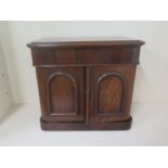 A small mahogany chiffonier type cabinet with a blind drawer above 2 cupboard doors, 43cm tall, 50 x