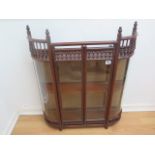 A liberty style mahogany display cabinet with bow glassd and 2 doors. 80cm wide, 68 x 15cm 120 in