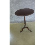 A 20th century mahogany tripod wine table. 72 cm tall 45 diameter in restored condition.