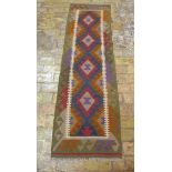 A hand knotted woollen- Maimana Kilim Runner. 195 x 60 cm.