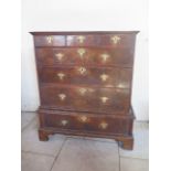 A Georgian walnut chest on stand with 3 small drawers above 4 long drawers. Replacement base. 119 cm