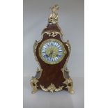 A walnut and ormolu french baroque style mantle clock striking on a bell, running, generally good