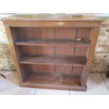 An oak open bookcase with 2 adjustable shelves. 123 cm tall x 122 cm x 34 cm. Removed from a
